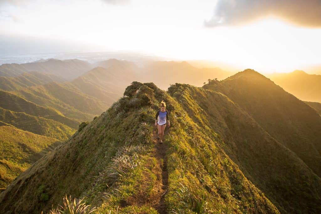 woman-hiking-on-a-cliff