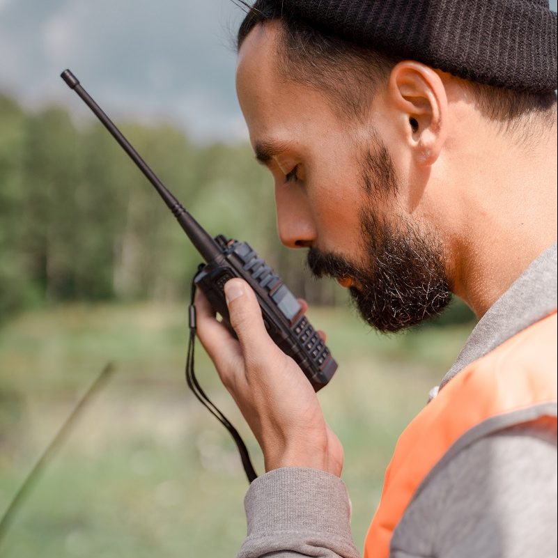 man-talking-on-walkie-talkie