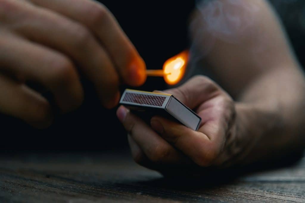 man-scratching-match